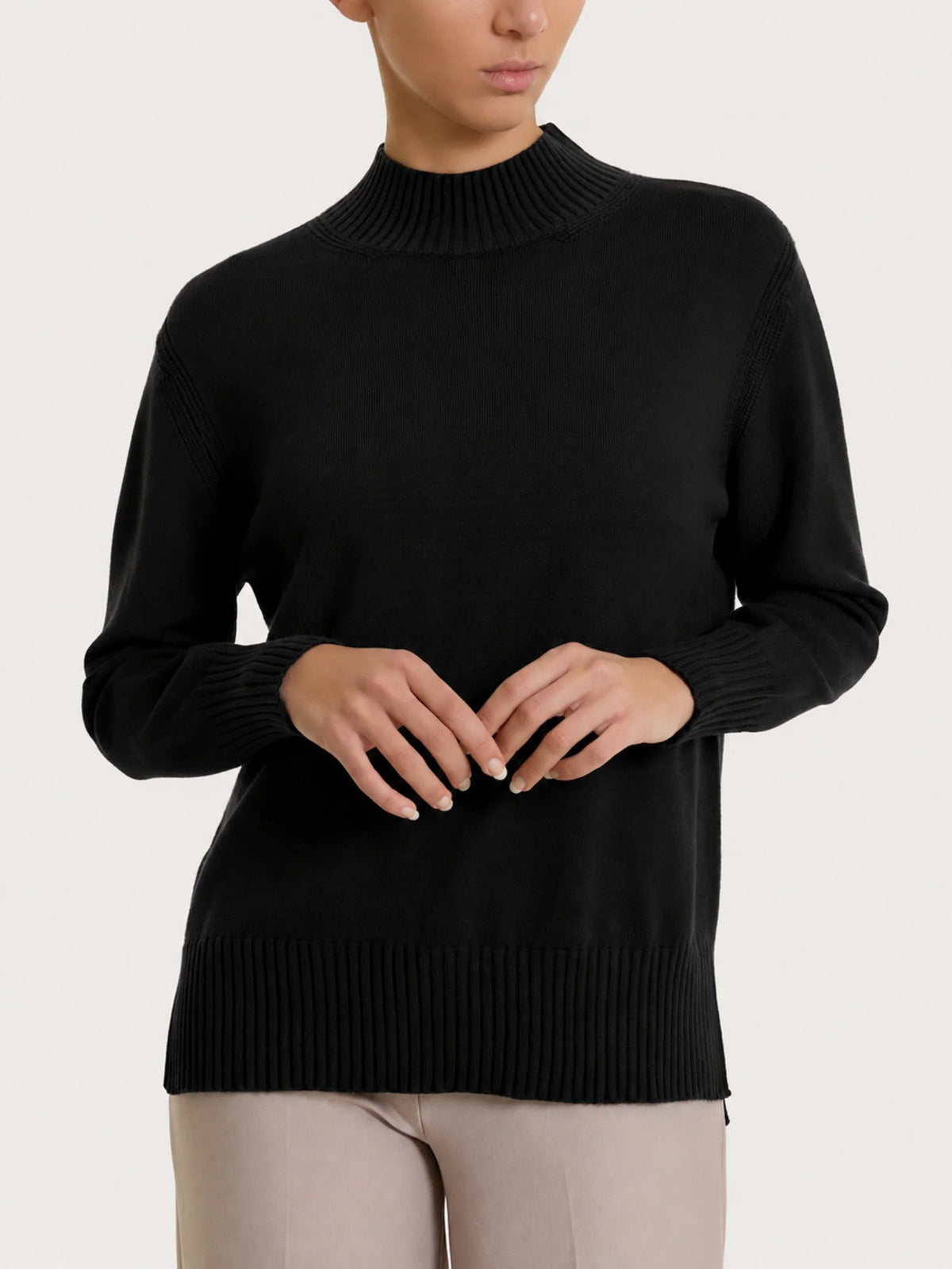 Caramel-colored mock neck spider sweater